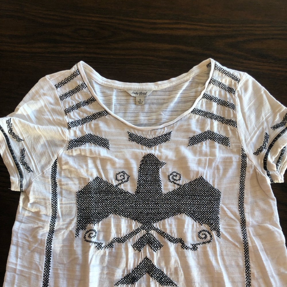 Lucky Brand cream detailed top.
